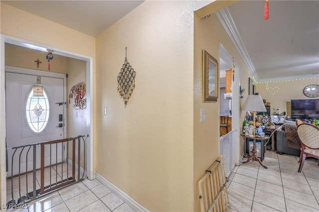 111 Narcissus Ln, Las Vegas, NV 89107 - entrance foyer featuring light tile patterned floors and ornamental molding