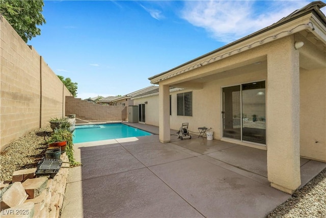 7125 Silver Ridge Peak St, Las Vegas, NV 89166 - view of swimming pool with a fenced backyard and a patio area