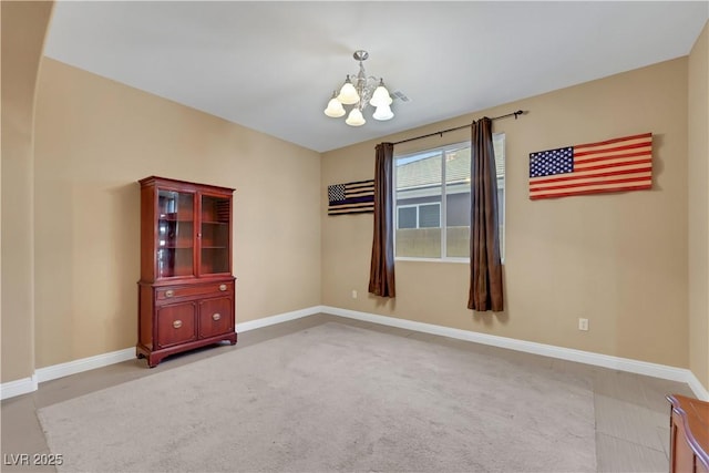 7125 Silver Ridge Peak St, Las Vegas, NV 89166 - carpeted spare room featuring a chandelier and baseboards