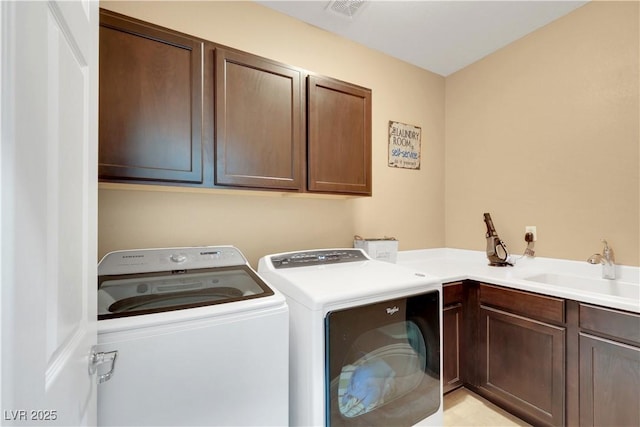 7125 Silver Ridge Peak St, Las Vegas, NV 89166 - laundry room featuring cabinet space and washer and dryer