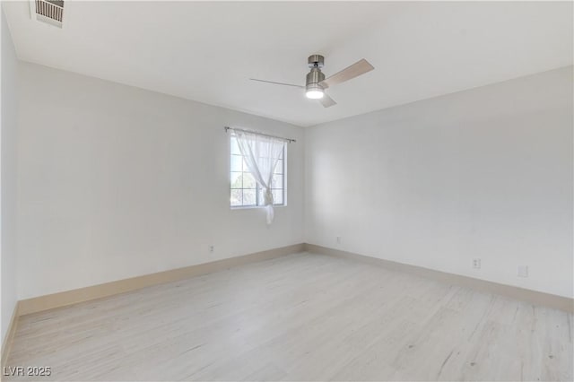 9409 Hershey Ln, Las Vegas, NV 89134 - spare room with light wood-style floors and ceiling fan