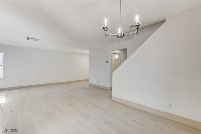 9409 Hershey Ln, Las Vegas, NV 89134 - unfurnished living room with light wood-style flooring and baseboards
