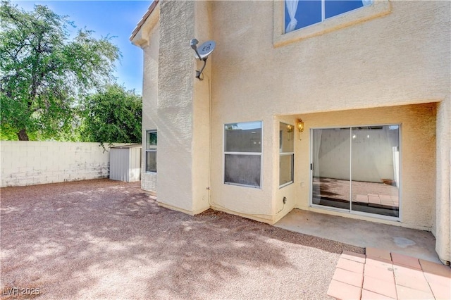 9409 Hershey Ln, Las Vegas, NV 89134 - back of property with a patio and stucco siding