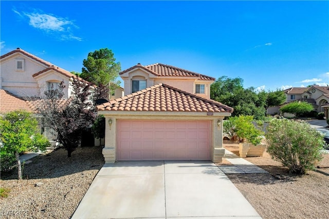 9409 Hershey Ln, Las Vegas, NV 89134 - mediterranean / spanish home with a tile roof, stucco siding, driveway, and an attached garage