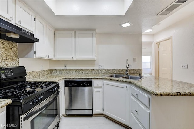 9409 Hershey Ln, Las Vegas, NV 89134 - kitchen with appliances with stainless steel finishes, exhaust hood, a peninsula, and white cabinets