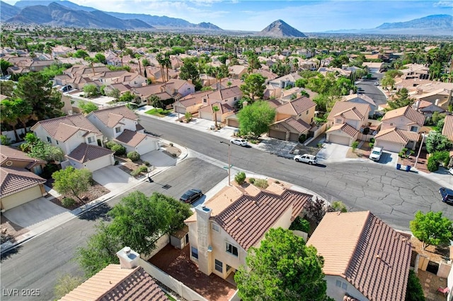 9409 Hershey Ln, Las Vegas, NV 89134 - aerial perspective of suburban area featuring a mountainous background