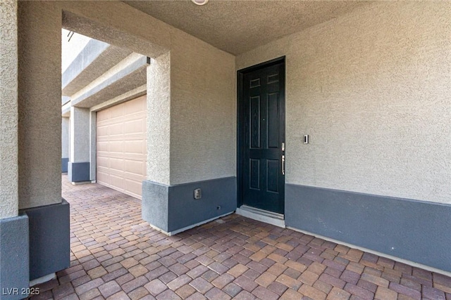 7615 Quail Dust St, North Las Vegas, NV 89084 - property entrance with stucco siding