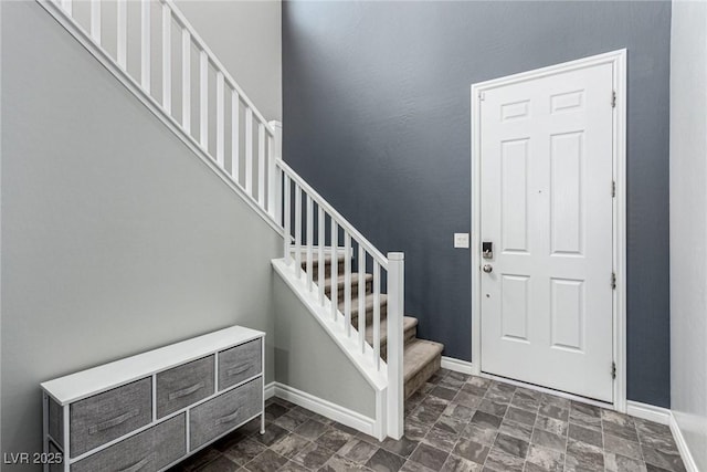 7615 Quail Dust St, North Las Vegas, NV 89084 - entryway featuring stairs and stone finish flooring