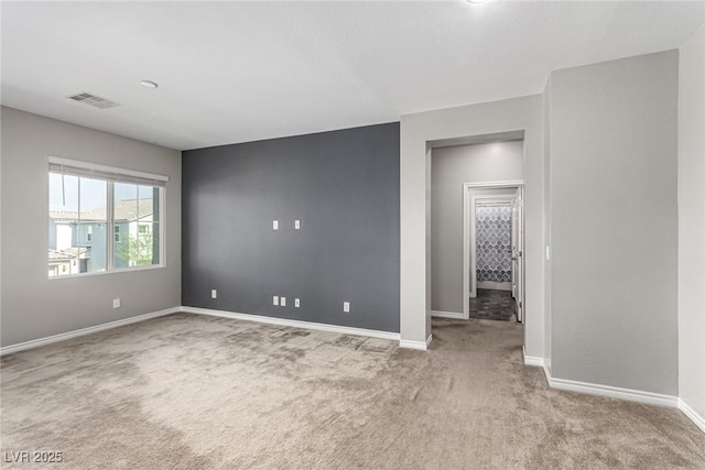 7615 Quail Dust St, North Las Vegas, NV 89084 - spare room featuring carpet flooring and baseboards