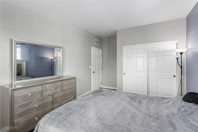 7615 Quail Dust St, North Las Vegas, NV 89084 - carpeted bedroom with a closet and baseboards