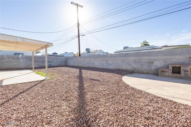 119 Cedar St, Henderson, NV 89015 - fenced backyard featuring a patio area