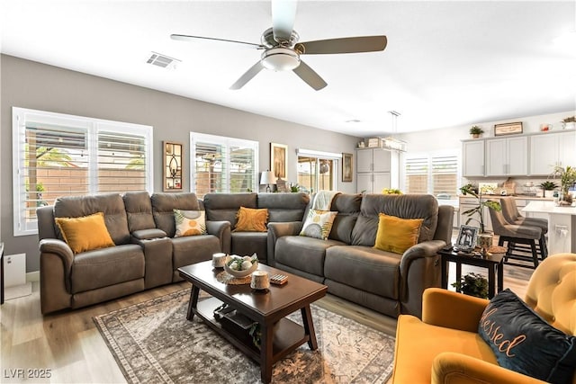 1981 Komodo Dragon Ct, North Las Vegas, NV 89032 - living room featuring light wood-style floors and ceiling fan