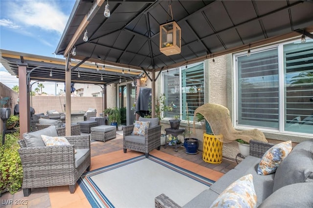 1981 Komodo Dragon Ct, North Las Vegas, NV 89032 - view of patio with an outdoor hangout area and a gazebo