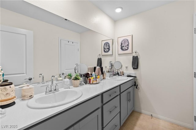 1981 Komodo Dragon Ct, North Las Vegas, NV 89032 - full bathroom with double vanity and tile patterned flooring