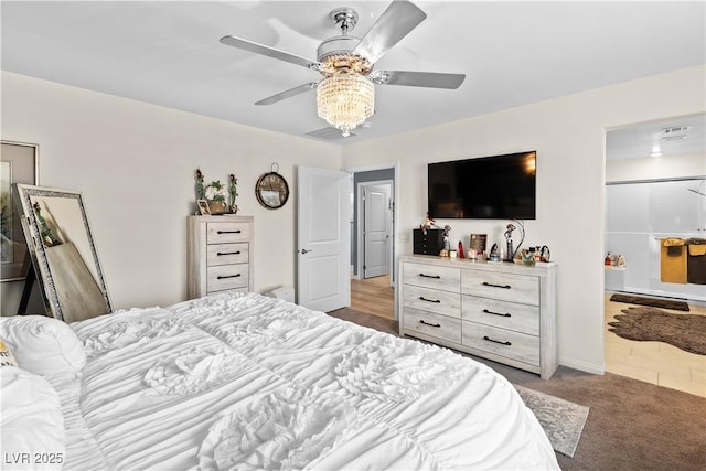 1981 Komodo Dragon Ct, North Las Vegas, NV 89032 - carpeted bedroom featuring ensuite bathroom and ceiling fan