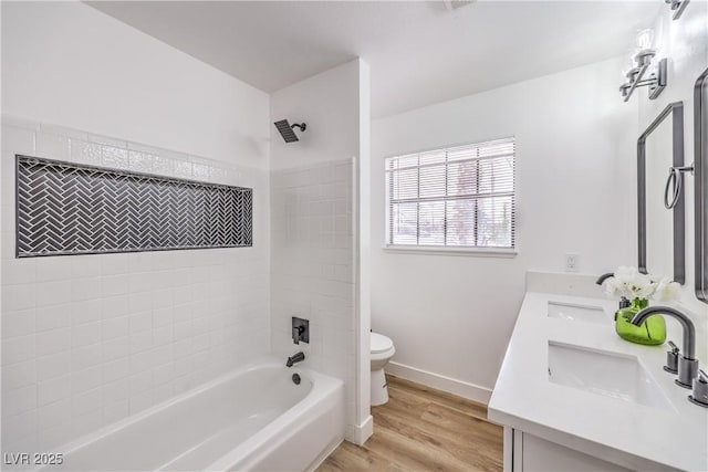4616 Eureka St, Las Vegas, NV 89103 - bathroom featuring bathtub / shower combination, double vanity, and wood finished floors