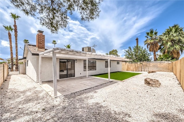 4616 Eureka St, Las Vegas, NV 89103 - rear view of property with stucco siding, a pergola, a fenced backyard, and a patio