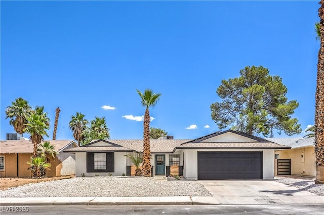 4616 Eureka St, Las Vegas, NV 89103 - single story home with stucco siding, an attached garage, and concrete driveway
