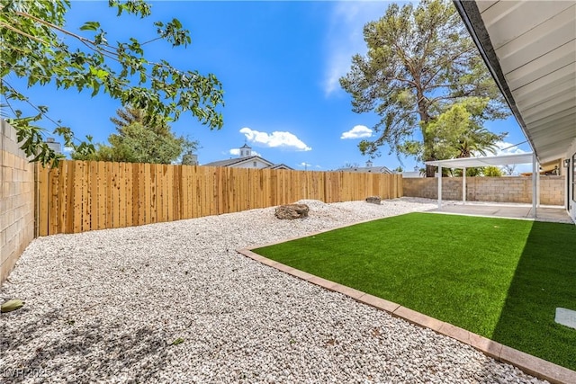 4616 Eureka St, Las Vegas, NV 89103 - fenced backyard with a patio area