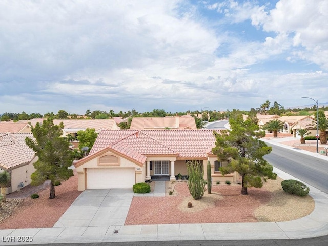 9325 Yucca Blossom Dr, Las Vegas, NV 89134 - mediterranean / spanish-style house with an attached garage, stucco siding, a tile roof, driveway, and a residential view