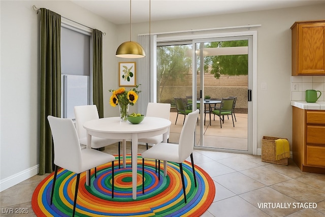 9325 Yucca Blossom Dr, Las Vegas, NV 89134 - dining space with light tile patterned floors