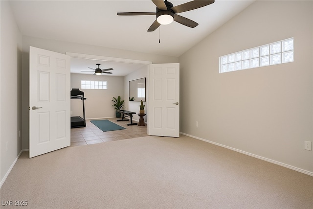 9325 Yucca Blossom Dr, Las Vegas, NV 89134 - exercise area featuring light carpet, ceiling fan, lofted ceiling, and light tile patterned floors