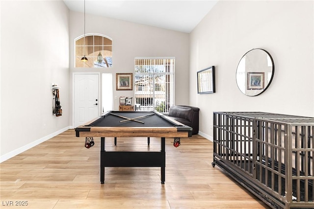 24 Staghorn St, Henderson, NV 89012 - rec room with billiards table, light wood finished floors, and high vaulted ceiling