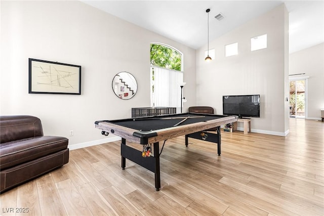 24 Staghorn St, Henderson, NV 89012 - rec room featuring high vaulted ceiling, billiards, and light wood-style flooring