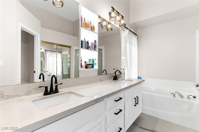 24 Staghorn St, Henderson, NV 89012 - bathroom featuring double vanity, a bath, and healthy amount of natural light