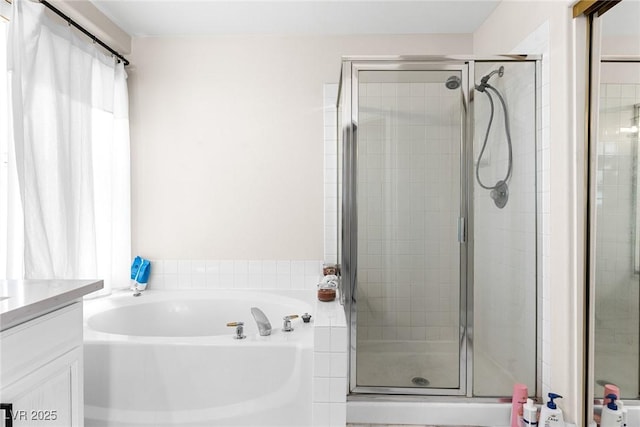 24 Staghorn St, Henderson, NV 89012 - full bath featuring a garden tub, a stall shower, and vanity