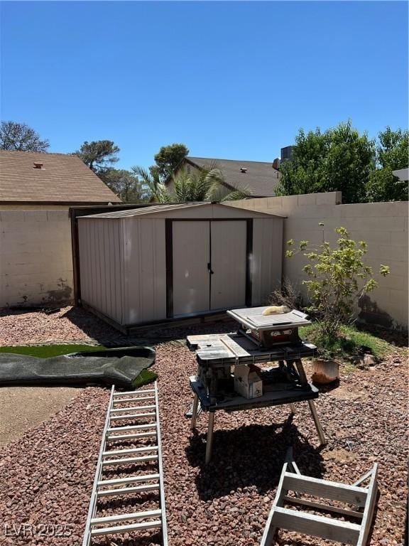 7247 Manatee Ct, Las Vegas, NV 89147 - view of yard featuring a storage unit