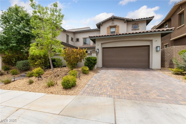 367 Pollino Peaks St, Las Vegas, NV 89138 - mediterranean / spanish-style home featuring stucco siding, decorative driveway, and a tiled roof