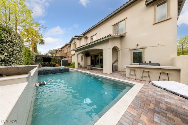 367 Pollino Peaks St, Las Vegas, NV 89138 - view of pool with a bar and a patio