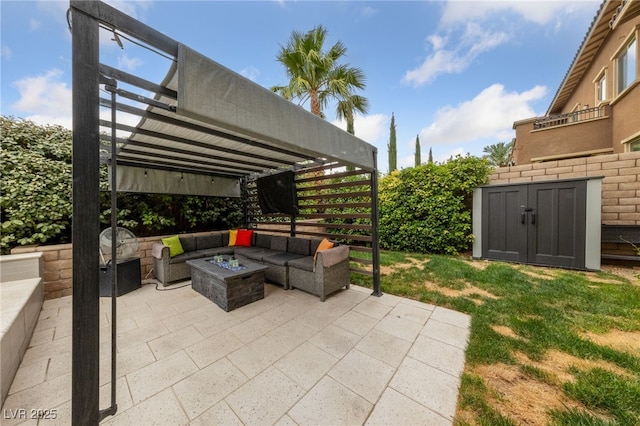 367 Pollino Peaks St, Las Vegas, NV 89138 - view of patio with an outdoor living space with a fire pit, a pergola, and a storage unit
