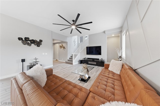 367 Pollino Peaks St, Las Vegas, NV 89138 - living room featuring stairway, a ceiling fan, and wood finished floors