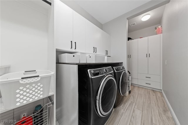 367 Pollino Peaks St, Las Vegas, NV 89138 - laundry area with washing machine and clothes dryer and cabinet space