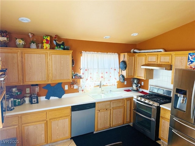 4525 Ranch Foreman Rd, North Las Vegas, NV 89032 - kitchen with stainless steel appliances, under cabinet range hood, light brown cabinets, light countertops, and recessed lighting