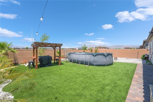 6209 Gambetta St, Las Vegas, NV 89115 - fenced backyard with a mountain view