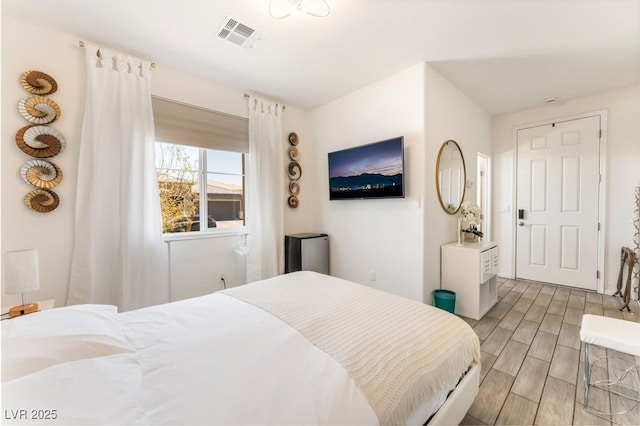 6209 Gambetta St, Las Vegas, NV 89115 - bedroom with wood tiled floors