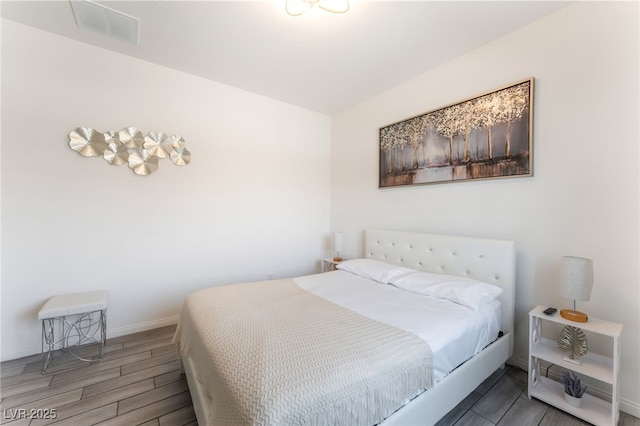 6209 Gambetta St, Las Vegas, NV 89115 - bedroom featuring wood tiled floors and baseboards