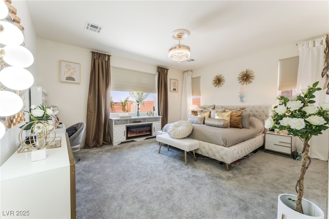 6209 Gambetta St, Las Vegas, NV 89115 - carpeted bedroom featuring a glass covered fireplace