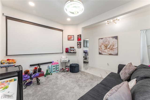 6209 Gambetta St, Las Vegas, NV 89115 - home theater with a chandelier, marble look tiles, and recessed lighting
