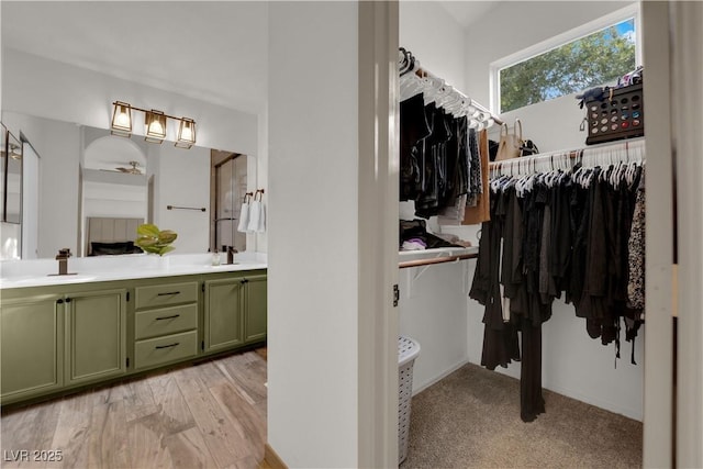 9089 Harvest Season Ct, Henderson, NV 89074 - full bathroom featuring double vanity and a spacious closet
