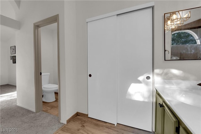 9089 Harvest Season Ct, Henderson, NV 89074 - bathroom featuring vanity and a chandelier