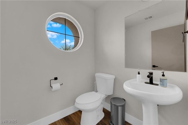 9089 Harvest Season Ct, Henderson, NV 89074 - half bath with baseboards and wood finished floors