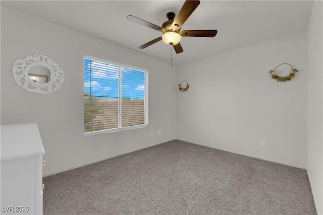 9089 Harvest Season Ct, Henderson, NV 89074 - carpeted spare room with a ceiling fan