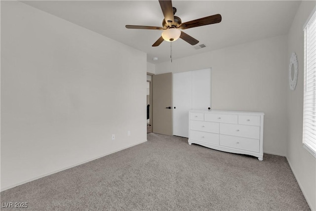 9089 Harvest Season Ct, Henderson, NV 89074 - unfurnished bedroom featuring carpet flooring and ceiling fan