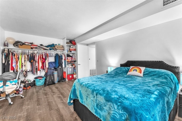 1405 Vegas Valley Dr Unit 347, Las Vegas, NV 89169 - bedroom featuring wood finished floors and a closet