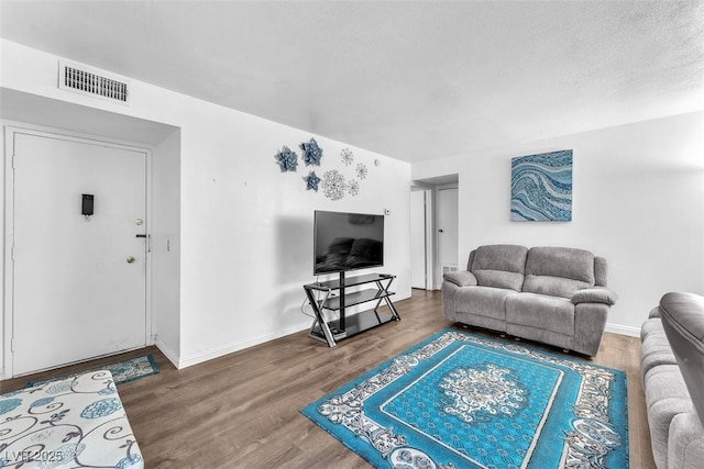 1405 Vegas Valley Dr Unit 347, Las Vegas, NV 89169 - living area featuring wood finished floors and baseboards