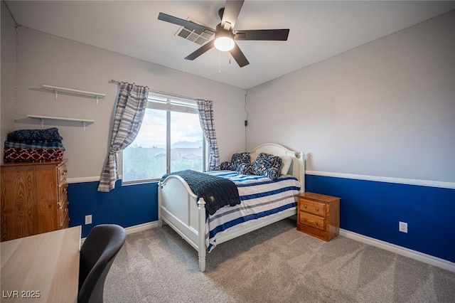 6937 Puetollano Dr, North Las Vegas, NV 89084 - carpeted bedroom with baseboards and ceiling fan